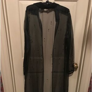 Ritmo di Perla sheer long robe or evening coat with beaded embellishments.